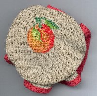 Dessus de pot de confiture orange