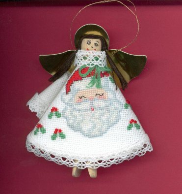 Ange brod&eacute; d'un p&egrave;re no&euml;l